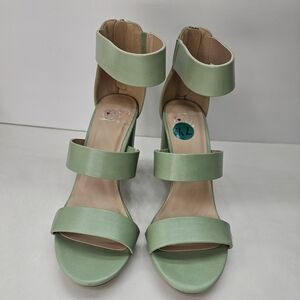 Pastel green heels with zippered back 7 1/2